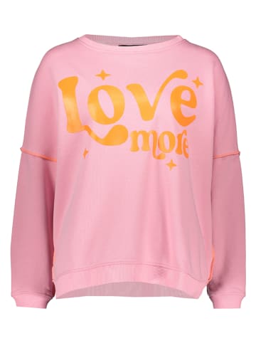 Sweatshirt "Love more" in Rosa