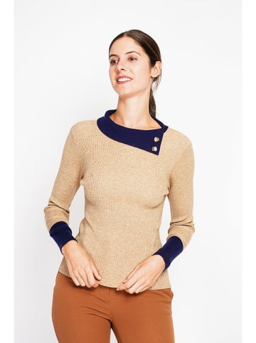 Sweter w kolorze beżowym
