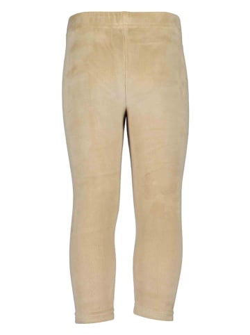Legginsy w kolorze beżowym
