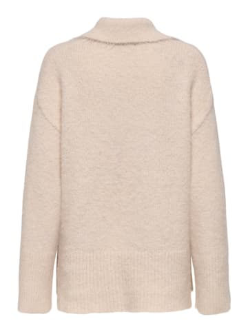 Sweter w kolorze beżowym
