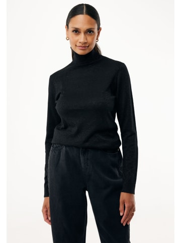 Sweter w kolorze beżowym