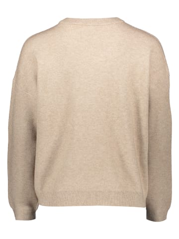 Sweter w kolorze beżowym