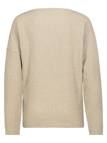 Sweter w kolorze beżowym
