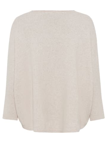 Sweter w kolorze beżowym