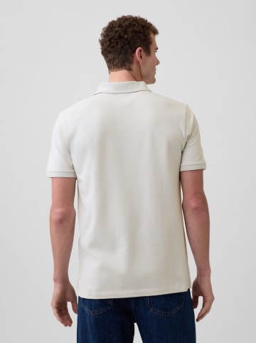 Poloshirt in Creme/ Blau