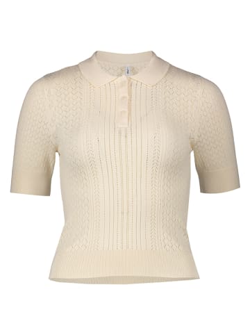 Sweter w kolorze beżowym