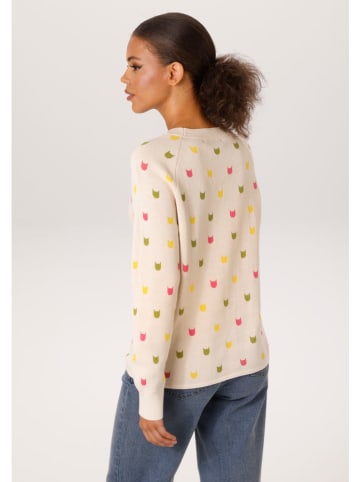 Sweter w kolorze beżowym