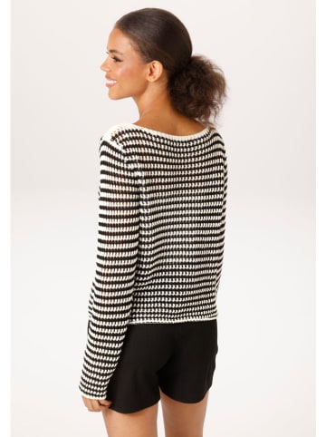 Sweter w kolorze kremowo-czarnym
