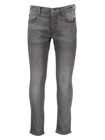 Dżinsy - Slim fit - w kolorze szarym