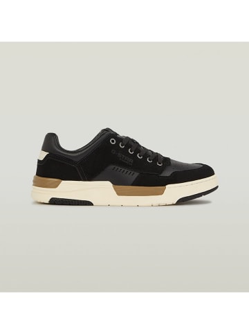 Sneakers in Schwarz/ Creme