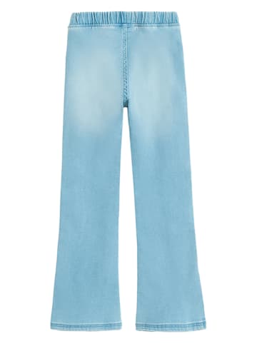 Dżinsy - Flare fit - w kolorze błękitnym