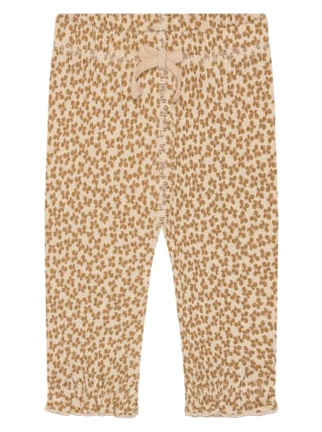 Legginsy w kolorze beżowym
