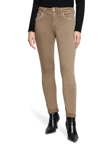 Dżinsy - Slim fit - w kolorze beżowym