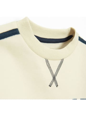 Bluza w kolorze kremowym