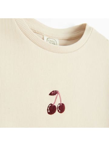 Koszulka w kolorze beżowym
