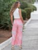 Isla Bonita by SIGRIS Spodnie w kolorze różowym ze wzorem