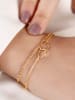 atelier MIU Vergold. Armkette mit Schmuckelement