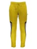 adidas Spodnie dresowe w kolorze żółtym