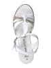 Marco Tozzi Skórzane sandały w kolorze srebrno-białym na koturnie