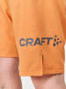 Craft Szorty "Core Essence" w kolorze pomarańczowym do biegania
