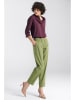 Nife Spodnie w kolorze zielonym