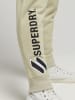 Superdry Spodnie dresowe w kolorze beżowym