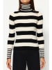 trendyol Rollkragenpullover in Schwarz/ Creme