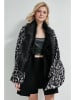 Shaka Poncho in Schwarz/ Grau