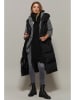 Cool and sexy Longbodywarmer zwart