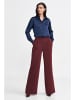 Nife Hose in Kaminrot