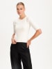 BGN Sweter w kolorze kremowym