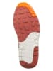 Nike Skórzane sneakersy "Air Max 1" w kolorze kremowo-pomarańczowym