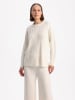 BGN Sweter w kolorze kremowym