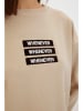 trendyol Bluza w kolorze beżowym