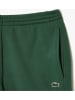 Lacoste Spodnie dresowe w kolorze zielonym
