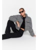 trendyol Steppjacke in Schwarz/ Weiß
