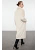 trendyol Wintermantel in Creme