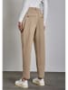 Street One Spodnie dresowe - Tapered fit - w kolorze beżowym