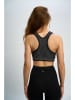 Marks & Spencer Sport-BH in Schwarz