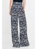 Nife Spodnie w kolorze granatowo-białym