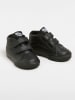 Vans Leder-Sneakers in Schwarz