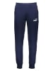 Puma Spodnie dresowe "Essentials" w kolorze granatowym