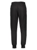 Puma Spodnie dresowe "Essentials+" w kolorze czarnym
