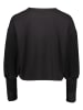 Puma Trainingsshirt "Studio Cloudspun" in Schwarz