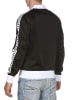 Arena Trainingsjacke in Schwarz/ Weiß