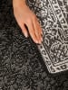 NORTHRUGS Outdoor-Wendeteppich "Kona" in Schwarz/ Weiß