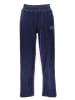 Puma Spodnie dresowe "Essentials Plus Velour" w kolorze granatowym