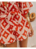 Milan Kiss Jumpsuit lichtroze/oranje