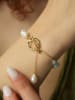 L'Atelier de Gaia Vergulde armband met edelstenen en parels