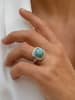 Nomad Vergold. Ring mit Edelstein
